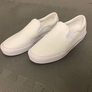 - White slip ons adidas NEVER worn perfect condition